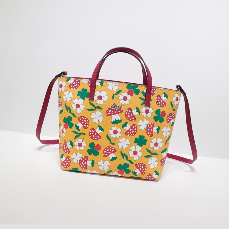 G*u*i shopping bags